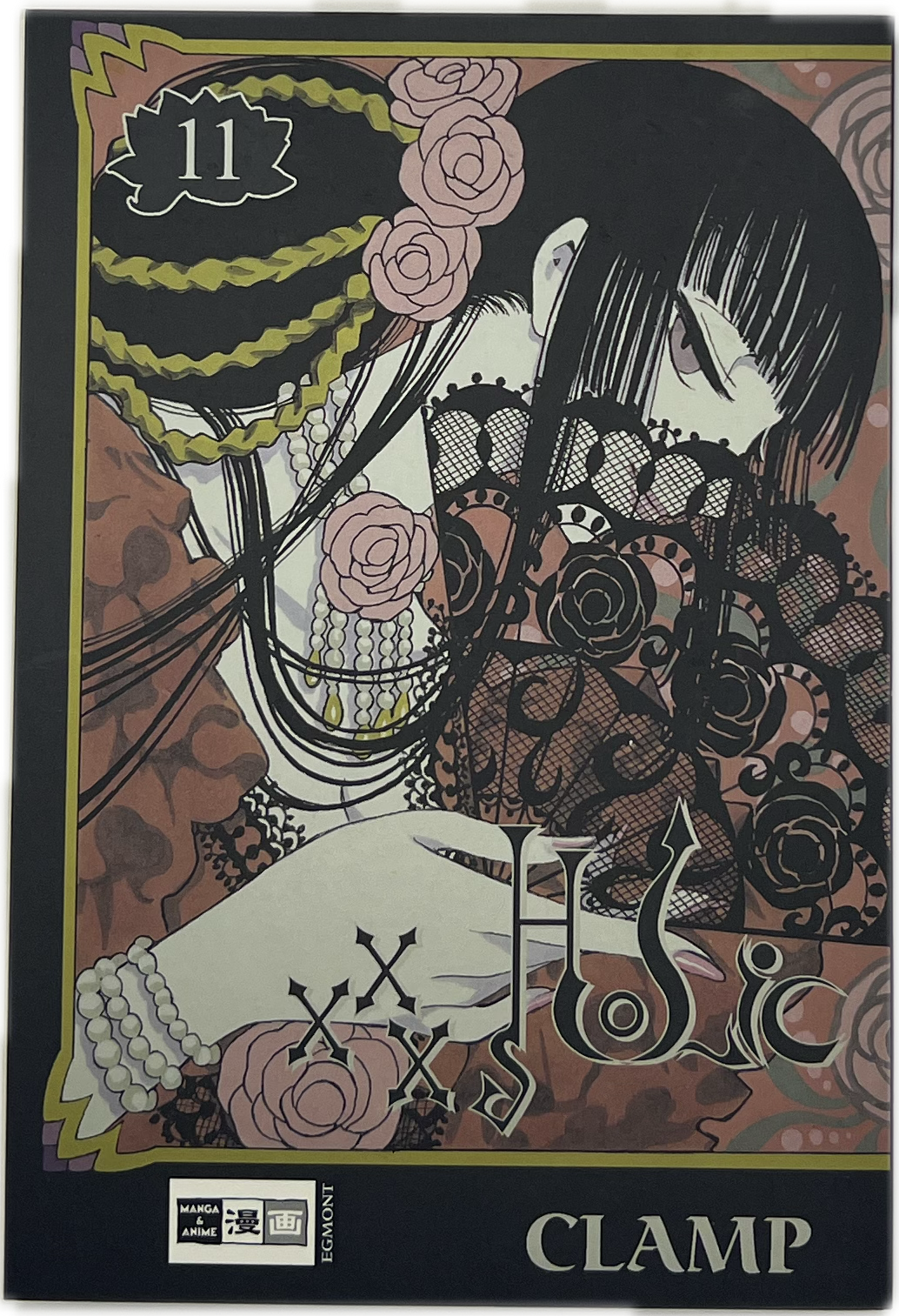 xxxHolic 11